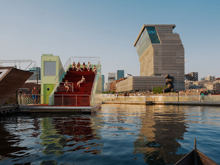 a group of people on a floating sauna