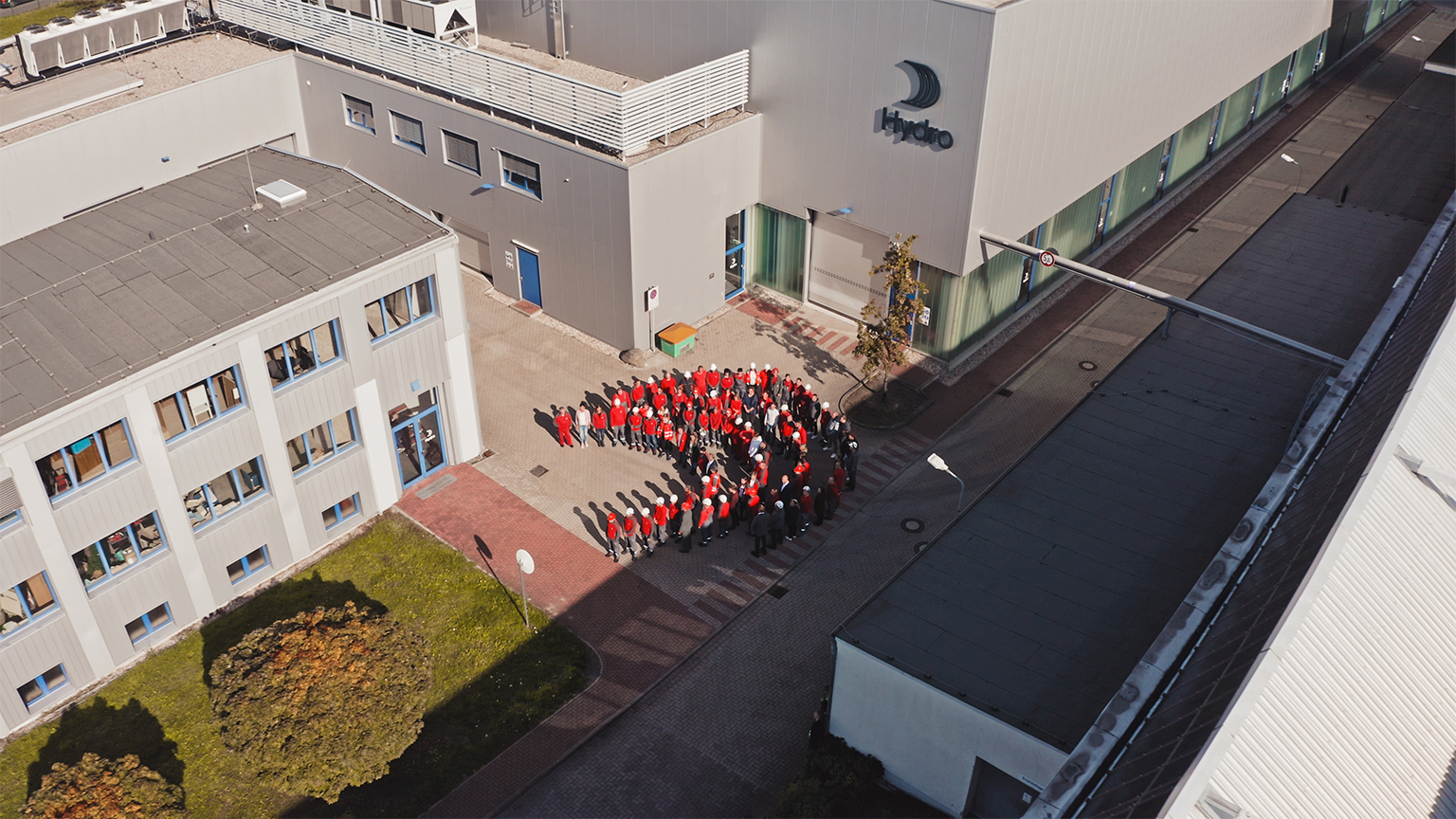 a group of people in uniform standing outside a building