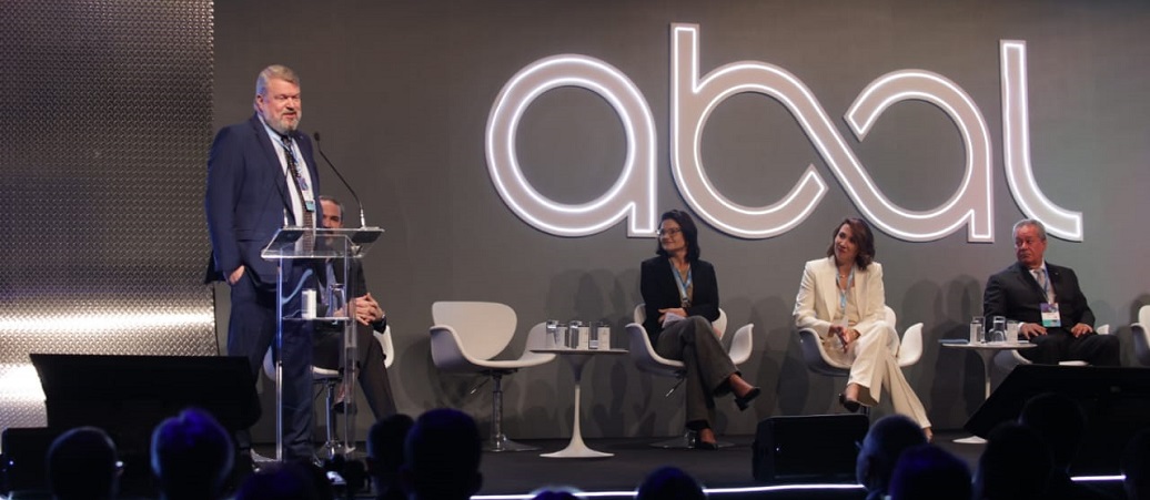 a man and a woman on a stage with a microphone